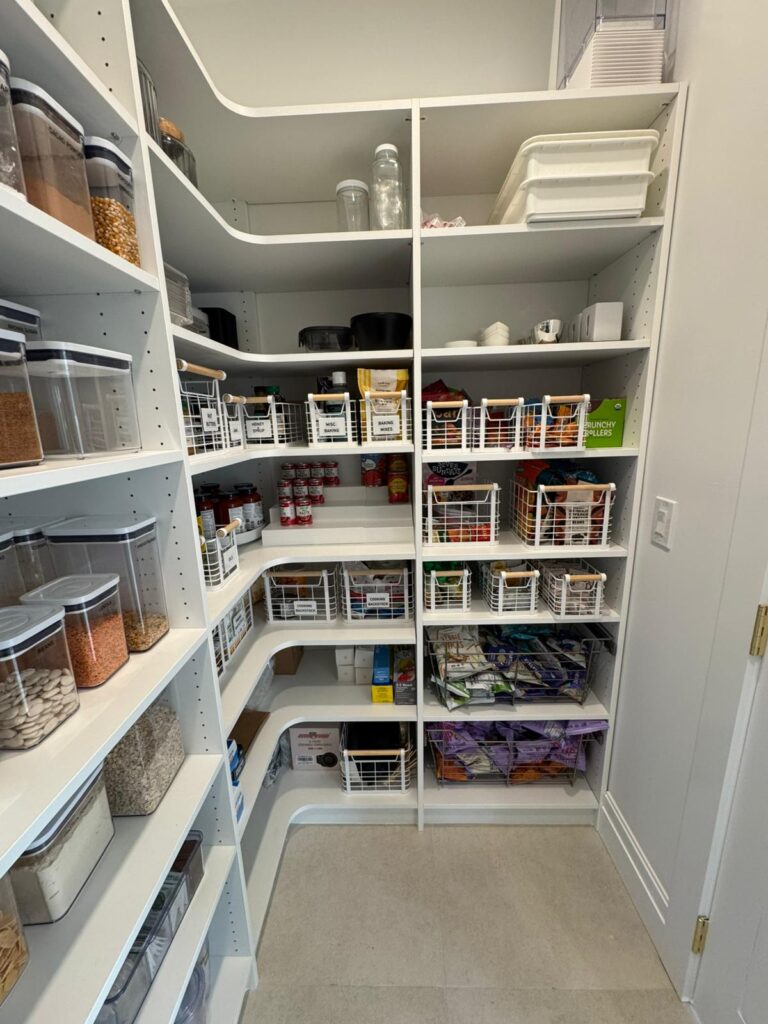 Organized closet system with white storage components and functional design