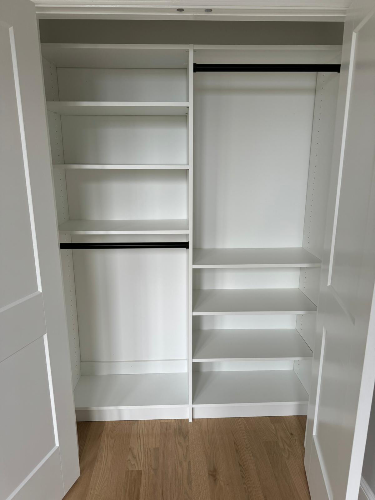 White storage system with organized shelving and integrated components